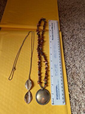 2 gold toned necklaces